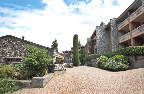 Porto Valtravaglia Apartamento | Acogedor apartamento para 6 personas con WIFI, piscina, TV y patio