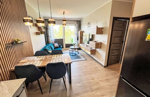 Gaski Apartamento | Acogedor apartamento con WIFI, bañera de hidromasaje, piscina, TV, balcón y aparcamiento