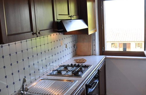 Il Poggio Apartamento | Acogedor apartamento con piscina, WIFI, TV, mascotas permitida, vista panorámica y aparcamiento