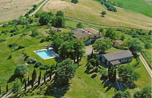 Il Poggio Apartamento | Acogedor apartamento con piscina, WIFI, TV, mascotas permitida, vista panorámica y aparcamiento