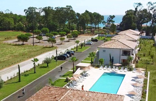 Ghisonaccia Apartamento | Apartamento con WIFI, piscina, A/C, TV, balcón, mascotas permitida, vista panorámica, aparcamiento