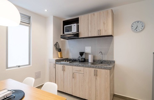 Financial District Apartamento | Nice Apartment in Zona G with Laundry Facilities