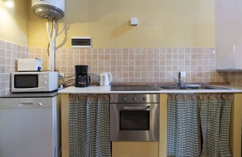 Novelli Apartamento | Apartamento con WIFI, piscina, TV, patio, mascotas permitida, vista panorámica, aparcamiento