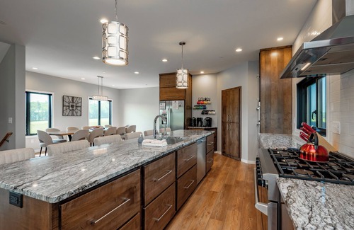 Waterfront Greens Casa | Night & Day: Lake Access, Hot Tub!