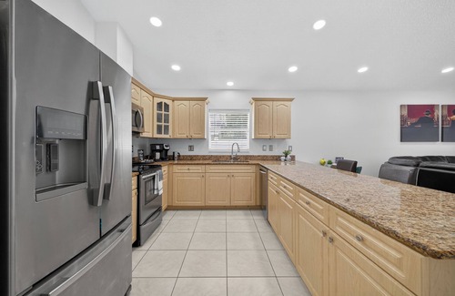 Tampa Casa | nLuxurious 4BR Home w/Private Pool, Gym, and Outdoor Kitchen near Busch Gardens