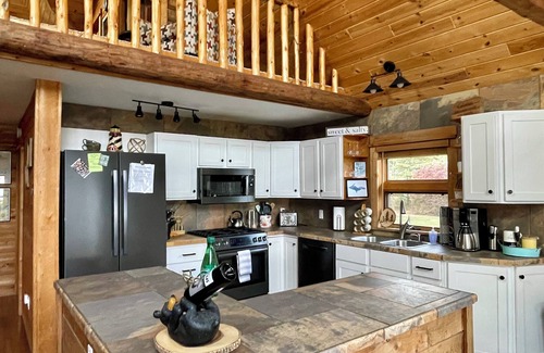 Nadeau Cabina | Majestic Log Home en 400 pies de frente al lago Michigan.
