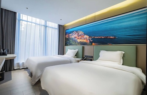 Haizhu Hotel | Norman Hotel - Guangzhou Haizhu District Binjiang East Road Subway - Free buffet breakfast - Free self-service laundry and drying - Free shuttle service during the Canton Fair in October and November