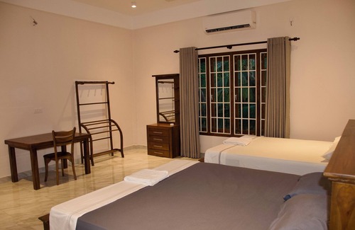 Pachchilaipalli Cama Y Desayuno | North Joy Resort Family room