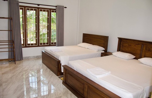 Pachchilaipalli Cama Y Desayuno | North Joy Resort Family room