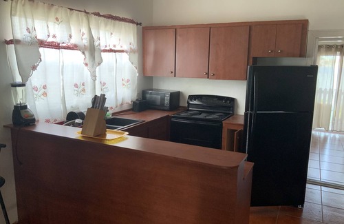 Cockburn Town Condominio | NORTH WINDS UNIT - VIEW OF THE CREEK