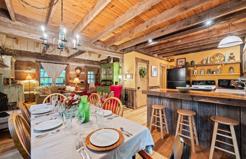 Gnaw Bone Cabina | Nostalgic log cabin antique furnishings nestled in wooded serenity Pet Friendly!