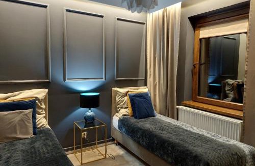 Beczkow Casa | Nowoczesne domki z kominkami, sauną i fotelem masującym Bayamo, Lucca, Hawana I i Hawana II