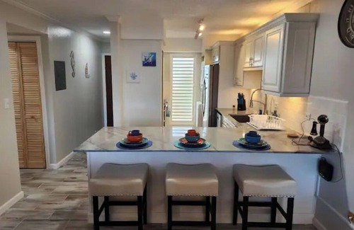 Orange Grove Condominio | Nubian Oasis- Beach Front -St Croix