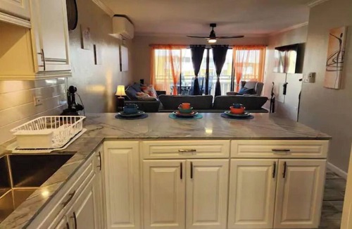 Orange Grove Condominio | Nubian Oasis- Beach Front -St Croix