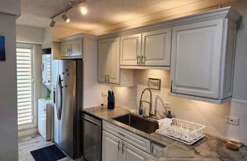 Orange Grove Condominio | Nubian Oasis- Beach Front -St Croix