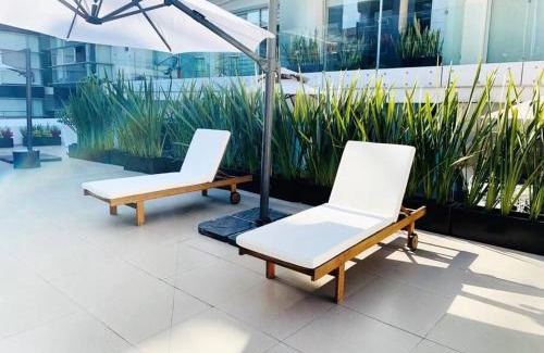 Roma Norte Apartamento | Nuevo! Loft hermoso con alberca. Wi-Fi Rapido.