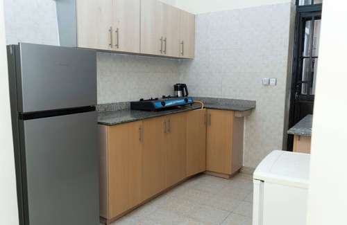 Kigali Apartamento | Nyumbani Downtown Cottages