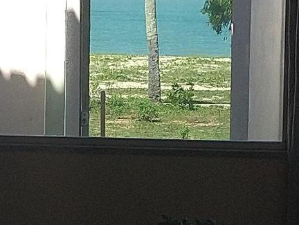 Caravelas Casa | O Paraíso é Aqui Abrolhos - Suíte privativa, cama de casal, ar condicionado e TV - Café da manhã de frente para o mar