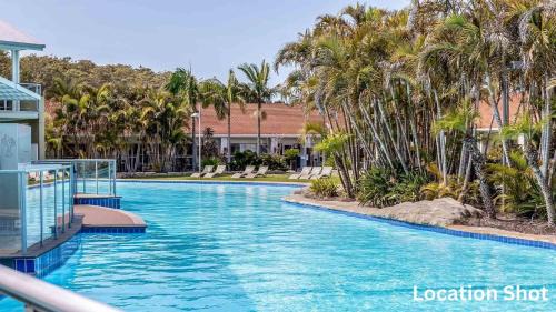 Salamander Bay Apartamento | Oaks Pacific Blue Pool spa more in complex