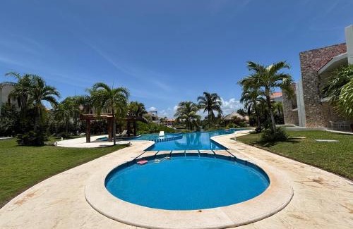 Puerto Aventuras Apartamento | Oasis facing the lagoon