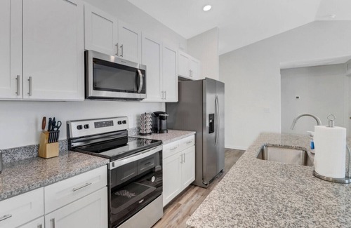 Diplomat Casa | Oasis W/ Heated Salt Water Pool & Private Pier! Great for 2 Families!