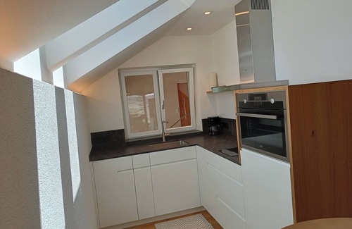 Berg/Monte Apartamento | Oberberghof - vacation apartment in Eppan Berg with terrace, garden and organic swimming pond