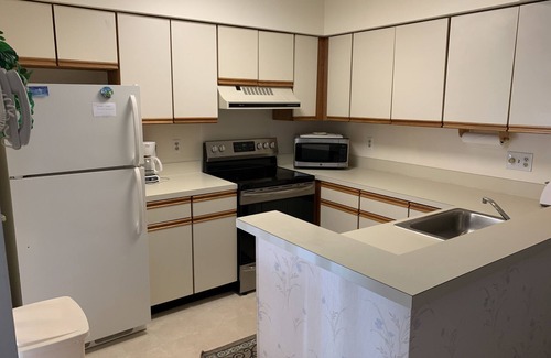 Heron Harbour Isle Condominio | Hermoso Bayside Condo