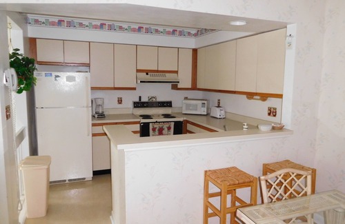 Heron Harbour Isle Condominio | Hermoso Bayside Condo