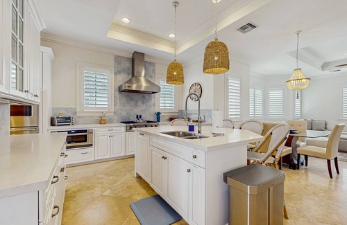 Ocean Ridge Casa | Ocean view estate w/ in ground outdoor pool, breezy terraces, and covered lanai