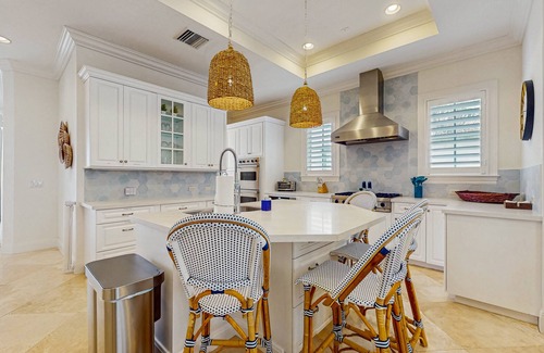Ocean Ridge Casa | Ocean view estate w/ in ground outdoor pool, breezy terraces, and covered lanai