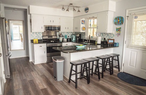 Emerald Isle Cabaña | Ocean view family cottage, just steps from the sea and close to everything.