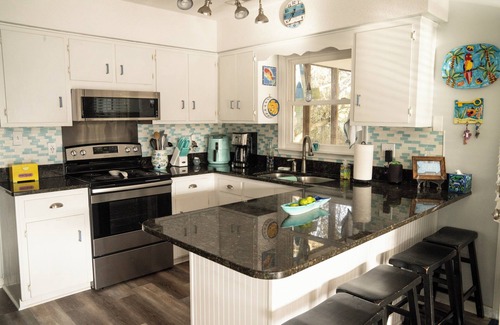 Emerald Isle Cabaña | Ocean view family cottage, just steps from the sea and close to everything.