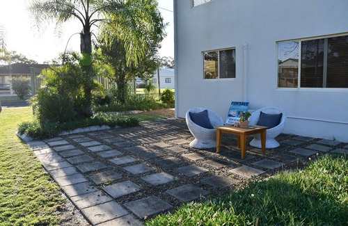 Woodgate Apartamento | Apartamento en planta baja con vista al mar frente a la playa virgen