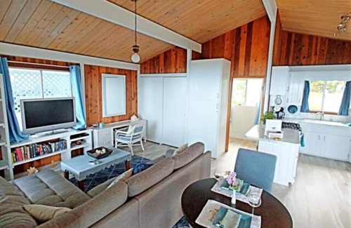 Papa Cabaña | Vistas al mar desde la cabaña privada Lanai de 1 habitación / 1 baño en una granja de café 100% Kona.