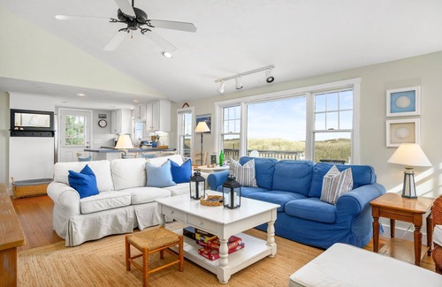 Sagamore Beach Casa | Oceanfront at Sagamore Beach with clean, crisp, Cape Cod interior and coastal furnishings