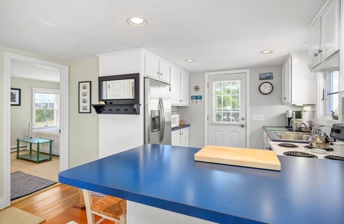 Sagamore Beach Casa | Oceanfront at Sagamore Beach with clean, crisp, Cape Cod interior and coastal furnishings