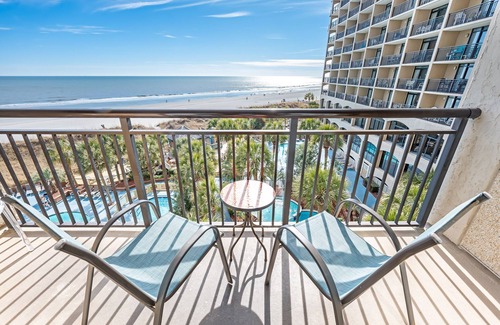 Windy Hill Condominio | Beachfront 1BR w/ balcony & pools