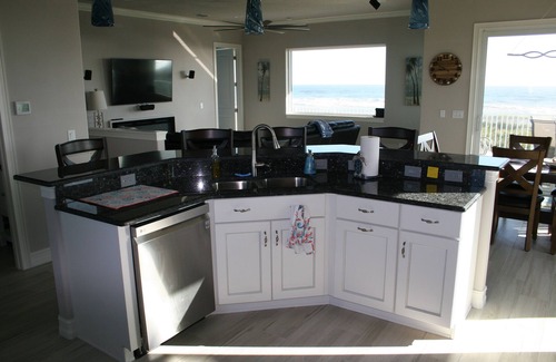 Palm Coast Casa | Oceanfront Executive Home with private beach and backyard dunes.