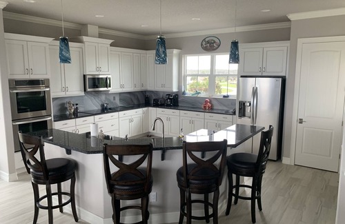 Palm Coast Casa | Oceanfront Executive Home with private beach and backyard dunes.
