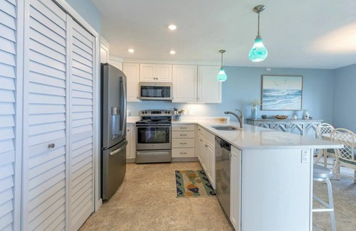 New Smyrna Beach Condominio | Oceanfront Ground-Floor Retreat on No-Drive Beach | Peace & Comfort