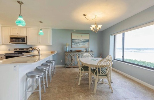 New Smyrna Beach Condominio | Oceanfront Ground-Floor Retreat on No-Drive Beach | Peace & Comfort