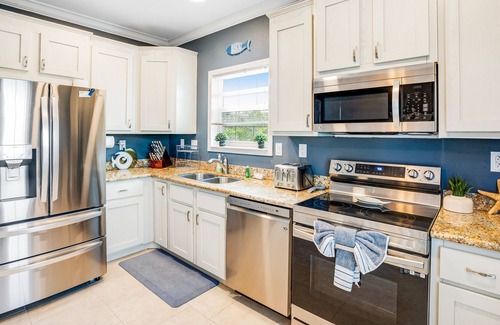 Bay Point Casa | Oceanfront home with 2 decks, patio, pool, kayaks, & private dock - dogs OK
