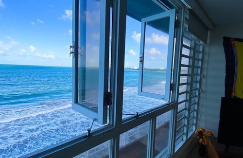 Playa Fortuna Condominio | Oceanfront Paradise on Luquillo Beach 2-bedroom rooftop Puerto Rico Island