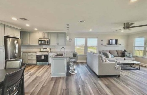 Port Bolivar Casa | Oceanfront Serene Coastal Escape in Crystal Beach, TX: Yellow Daisy by the Sea