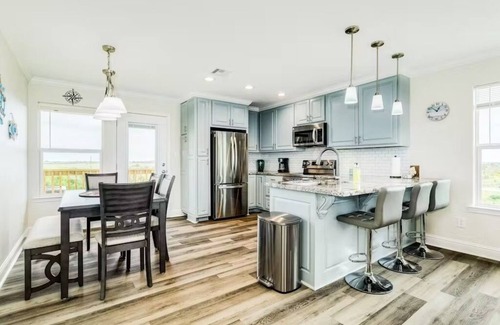 Port Bolivar Casa | Oceanfront Serene Coastal Escape in Crystal Beach, TX: Yellow Daisy by the Sea