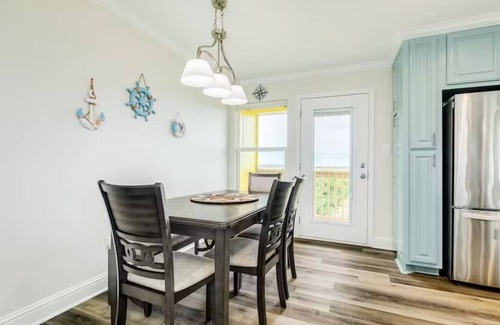 Port Bolivar Casa | Oceanfront Serene Coastal Escape in Crystal Beach, TX: Yellow Daisy by the Sea