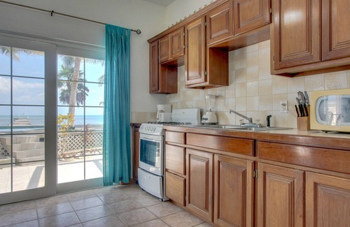 Boca Ciega Casa | Villa frente al mar con piscina compartida, acceso a la playa, excelentes vistas.