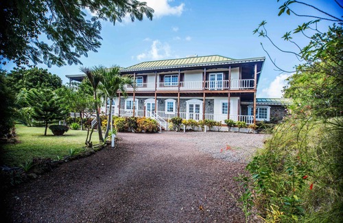 Lance aux Epines Villa | Villa de estilo colonial con vista al mar y piscina grande