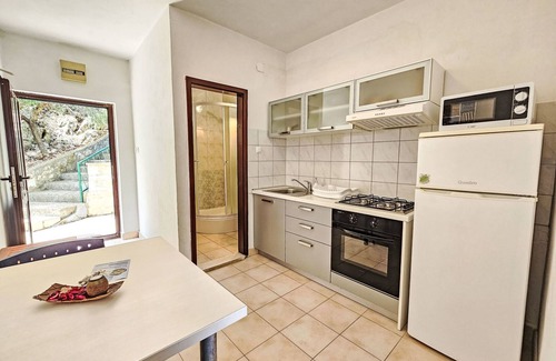 Bogomolje Apartamento | Octopus by Interhome