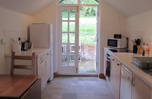 Newcastle-Under-Lyme Cabaña | Antiguo Bakehouse. Cabañas con encanto en terrenos apartados de finca privada histórica